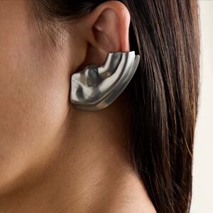 Khaite silver tone earring